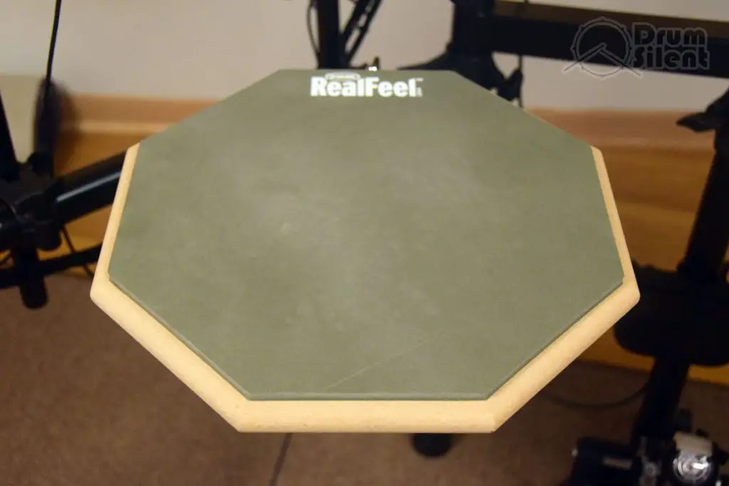 https://www.drumsilent.com/wp-content/uploads/2019/02/Evans-RealFeel-2-Sided-Practice-Pad-Angled-1024x683.jpg